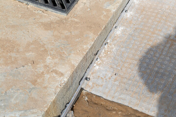 Pouring a house walkway. Preparing for pouring concrete.