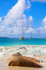 Paradise Beach Scene with Yachts and Azure Waters
