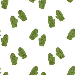 Vector seamless pattern with warm winter mittens. Cute green woven and knitted mittens on white background. Seamless print with cozy mittens in flat design. Pattern illustration.