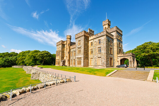 View of Lews Castle, a gothic revival styled Scottish castle built in the 1800s overlooking the harbor and town of Stornoway, Scotland, Lewis and Harris island, Outer Hebrides.