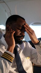 A pilot in distress on a plane