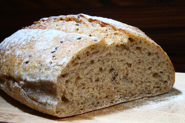 Artisan bread under dramatic light. Brazilian breakfast.