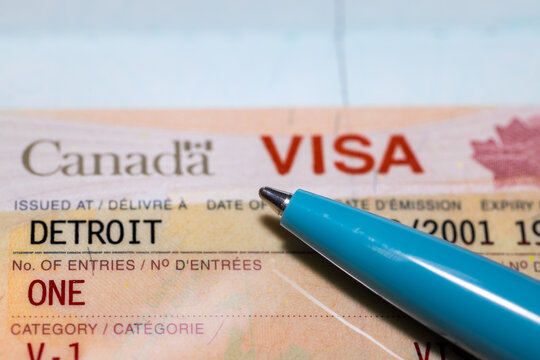 Close up view of Canadian non immigrant visa stamp on the passport issued at Detroit.