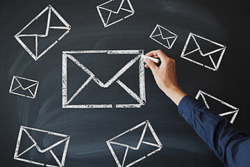 Email marketing strategy concept hand drawing email icons on chalkboard for business communication plan