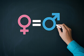 Gender equality concept male and female symbols equal rights feminism and gender studies on chalkboard