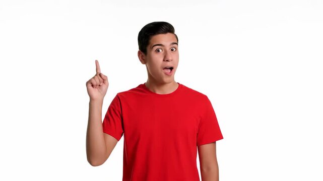 Energetic young man in red shirt pointing upward with enthusiasm on white screen background, concept for educational presentation, back to school announcement and tutorial inspiration - Powered by Adobe