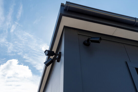Security camera on modern metal building