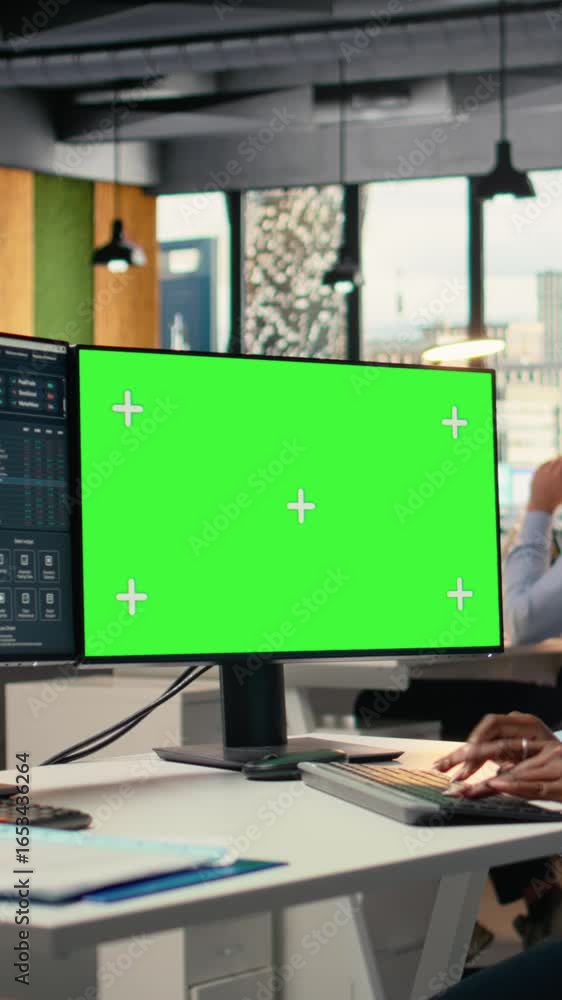 Poster vertical video equity analyst using isolated screen pc to reviews quarterly earnings, assessing stoc