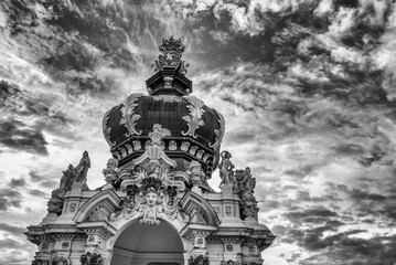 Historic cityscape of Dresden under dramatic summer clouds and vibrant blue sky background