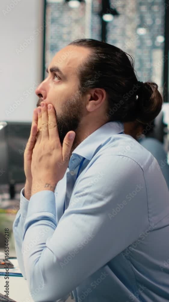 Aufkleber vertical video trader in office expresses concern as investment portfolio value declines after unexp