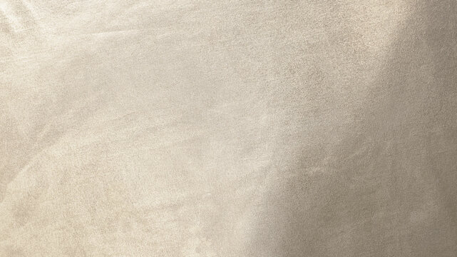 Light soft pale pastel brown gold golden beige nude white abstract background. Shiny silk fabric. Metallic shine. Light reflection. Design.