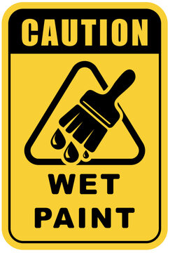 Caution sign indicating wet paint in a clearly marked area