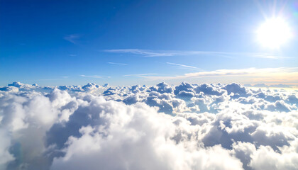 Aerial View: Bright Sunlit Cumulus Cloudscape, Serene Blue Sky, High Altitude, Peaceful Atmosphere, Inspirational Nature Photography.