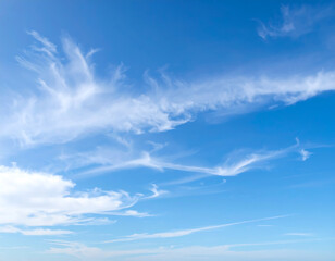 Serene Blue Sky with Wispy Cirrus Clouds: Peaceful, Bright, and Airy Summer Daytime Atmosphere.