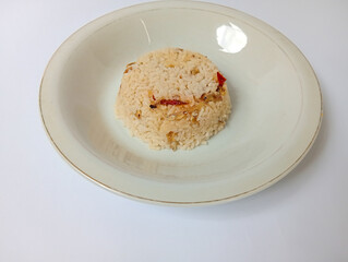 Nasi liwet. Indonesia cullenarry. Rice cook With onion, shallots and bay leaves. 