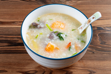 angle view fresh shrimps and beef porridge at horizontal composition