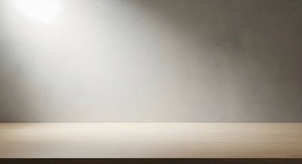 Minimalist studio background featuring an empty wooden table under a spotlight, set against a gray textured wall for product presentation.