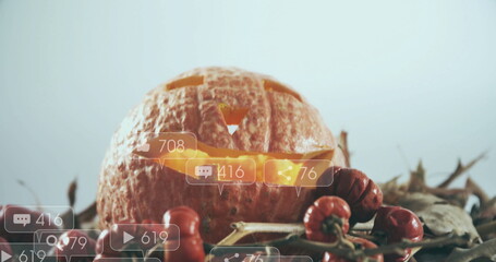 Carved pumpkin with social media notifications image over autumn decorations