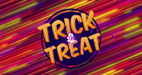 Fototapeta premium Image of trick or treat text over glowing light trails