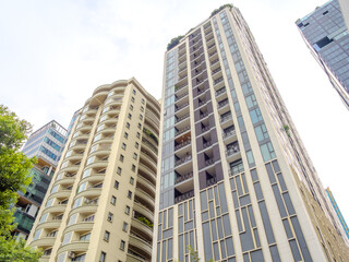 Fototapeta premium high rise towers building residential apartments and commercial buildings on Soi 21 Sukhumvit Rd Asoke BKK Bangkok Thailand