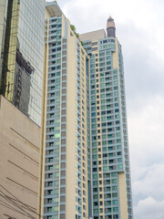 Obraz premium high rise towers building residential apartments and commercial buildings on Soi 21 Sukhumvit Rd Asoke BKK Bangkok Thailand