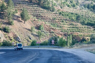Fototapeta premium Curved mountain road. Mountain road landscape. High quality 4k footage