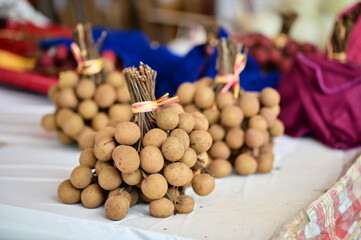 Fresh longan fruit with translucent white flesh and dark seed. Popular tropical fruit in Taiwan, also known as dragon eye fruit, sweet and juicy.