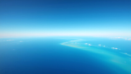 Beautiful abstract blue sea and sky with clouds reflection on the water at the horizon