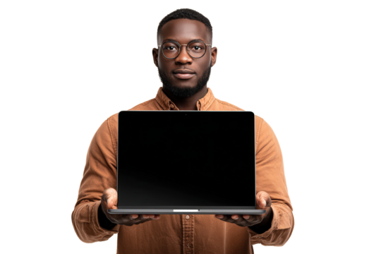 A young man stands confidently, wearing glasses and a brown shirt, presenting a laptop with a blank screen. He appears ready for a digital discussion or presentation