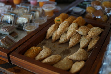 Traditional Indonesian Snacks and Pastries Displayed at Local Market