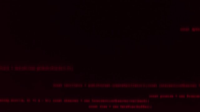 Abstract background of red blurred lines of program code on a black background