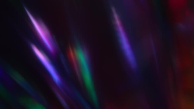 Iridescent lens flare. Soft focus color transition. Dreamlike lens flare on a dark background
