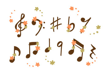 音符やト音記号に花をあしらった華やかな音楽イラスト素材、楽譜や背景デザインに使える装飾的なシンボルセット