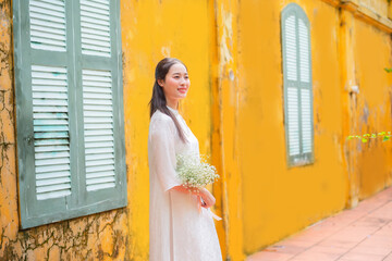 Vietnamese woman and landmark