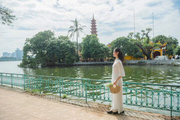 Vietnamese woman and landmark