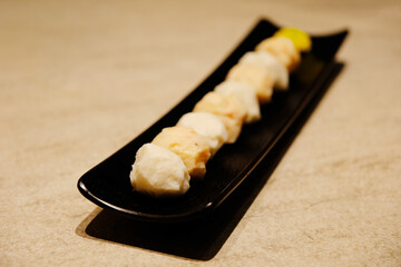 a row of fish balls on plate