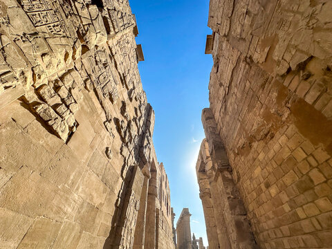 Ancient statues and obelisk at the entrance of Luxor Temple