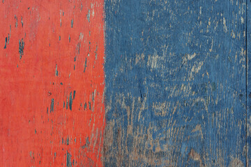 Red and Blue Weathered Wooden Plank With Rustic Texture