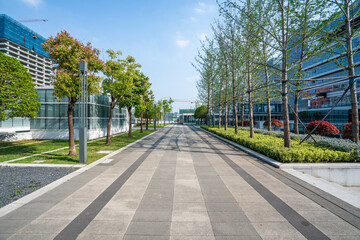 Empty road with modern buildings