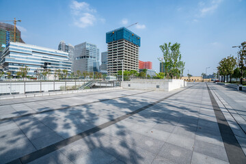 Fototapeta premium Empty road with modern buildings