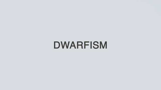 Dwarfism word diagnosed with a stethoscope held in hand on a white background, illustrating growth disorder, medical evaluation, healthcare concept, and patient awareness