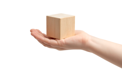 A hand holds a wooden block, symbolizing a foundational concept or a new beginning.