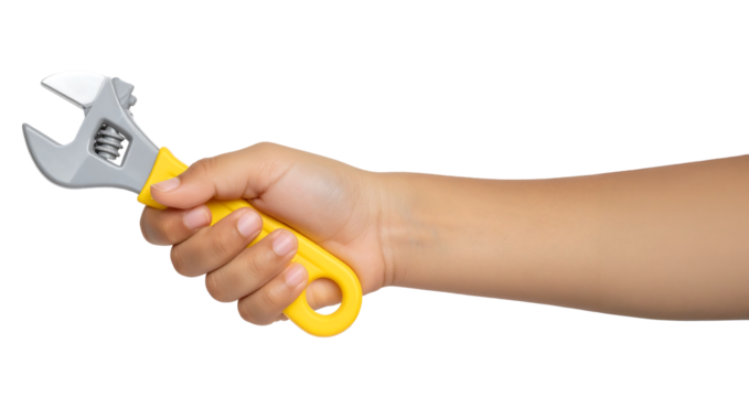 A child's hand holds a yellow and gray toy adjustable wrench.