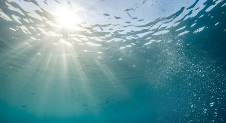 Underwater Sunlight Streaming Through Rippling Water Surface Creating Calm Serene Scene