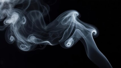 Abstract smoke patterns against black background