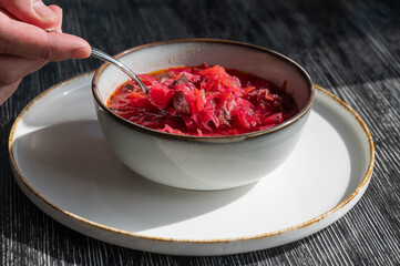 A bowl of borscht soup in a cafe. 