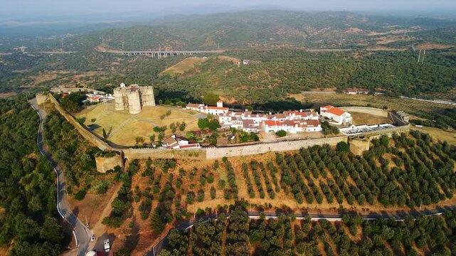 Pull-back reveals Evoramonte Castle and walled village, Estremoz, Alentejo, Portugal