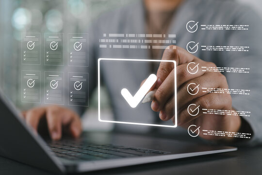 Businessman showing online document validation icon, quality assessment management With a checklist, business document evaluation process, consulting and market data report analysis.
