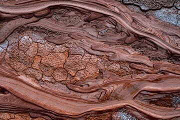 Mud volcanoes's clay river, closeup view, Muddy Vulcanos located in Buzau County, Romania, a National Landmark