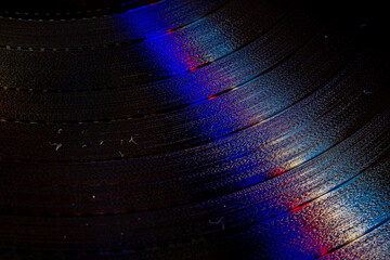 Vinyl record rotating in a macro shot